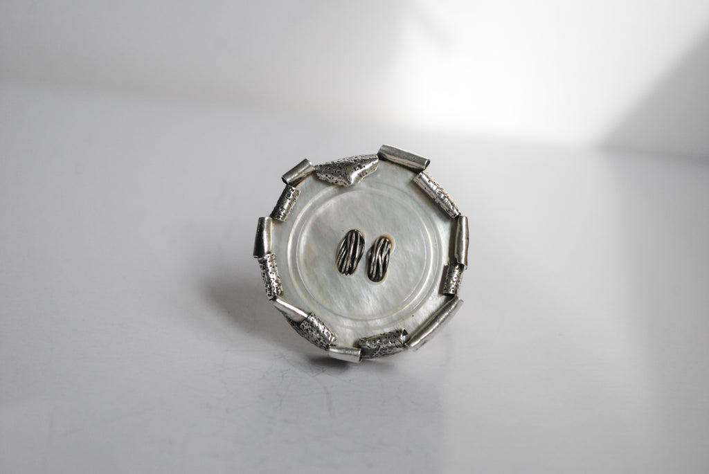 folded over silver button ring